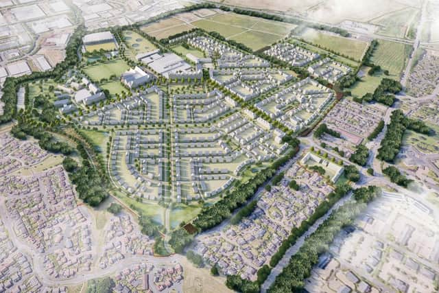This image shows the layout of the planned East of England Showground development with a leisure village in the foreground and housing around the sides.