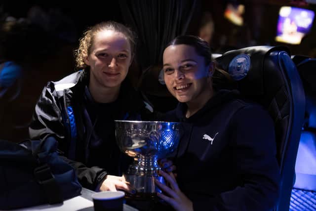 Rachel Lawrence and Evie Driscoll-King Driscoll of Posh Women with the Northants County Cup.