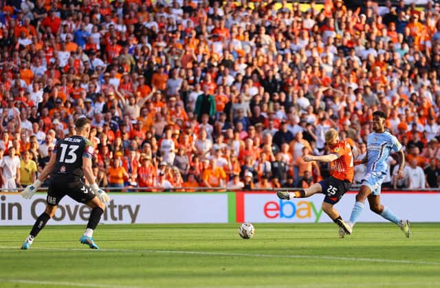 Joe Taylor (orange) in action for Luton Town in the Championship play-off final against Coventry City at Wembley. (Photo by Richard Heathcote/Getty Images)