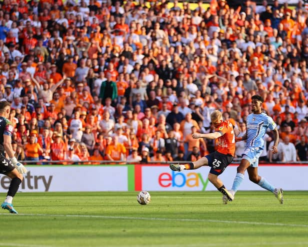Joe Taylor (orange) in action for Luton Town in the Championship play-off final against Coventry City at Wembley. (Photo by Richard Heathcote/Getty Images)
