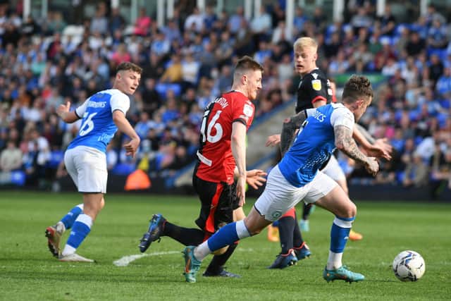 Harrison Burrows (left) sets up a goal for Sammie Szmodics against Blackburn on Good Friday. Photo: David Lowndes.