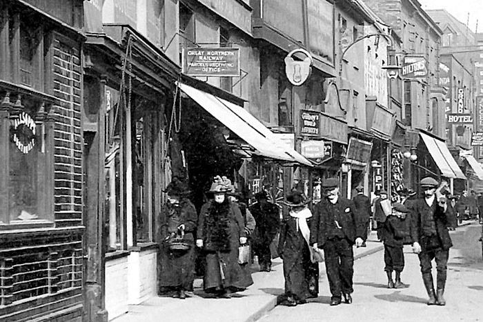 This view of Narrow Street was captured from outside of the Wagon & Horses pub (near left), which would eventually go on to become the site of FW Woolworths and TK Maxx.