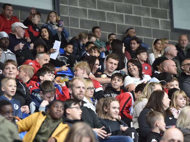Peterborough United fans are pictured enjoying the win over Bristol Rovers.