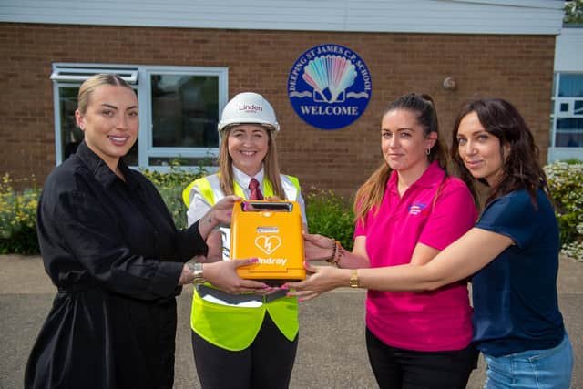 Weronika Maslak, sales manager at Linden Homes’ Springfields development, and assistant site manager Rosie Howard, with Becky Barrett, chair of the school’s parent-teacher association, and Karli Edmondson-Matthews.