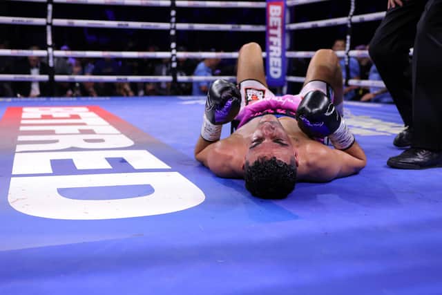 Jordan Gill after being knocked down by Zelfa Barrett during the WBA International Super-Featherweight title fight in Manchester Photo by Alex Livesey/Getty Images.