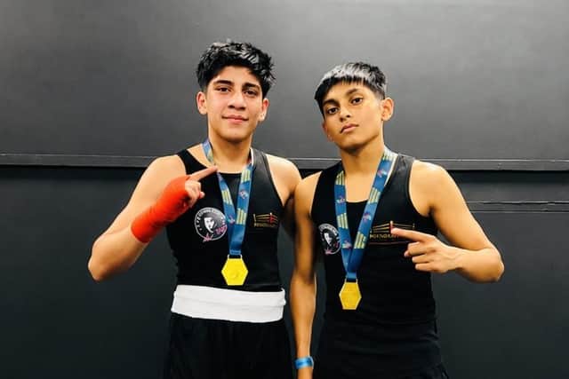 Jacob (left) and Zayne Hussain celebrate their gold medals in Dublin.