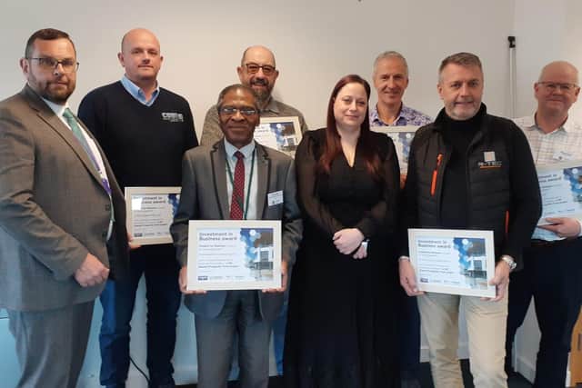 Cllr Ian Benney (left) with representatives from businesses successful in the first round 