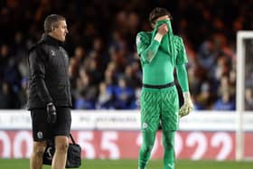 Nicholas Bilokapic of Peterborough United looks dejected after leaving the pitch through injury. Photo: Joe Dent.