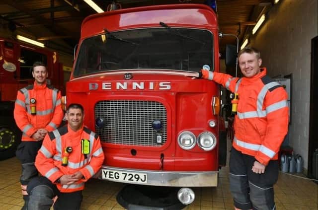 Peterborough Volunteer Fire Brigade firefighters Jacob Benton, Anthony Gould and Sam Pumps with the 1971 Dennis Rolls Royce fire engine in need of restoration.
