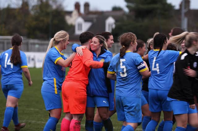 Peterborough Sports celebrate their county cup success over the Posh Development squad. Photo: Tim Symonds.