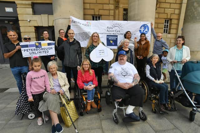 Peterborough Unlimited campaigners gathered outside the Town Hall. Photo: David Lowndes.