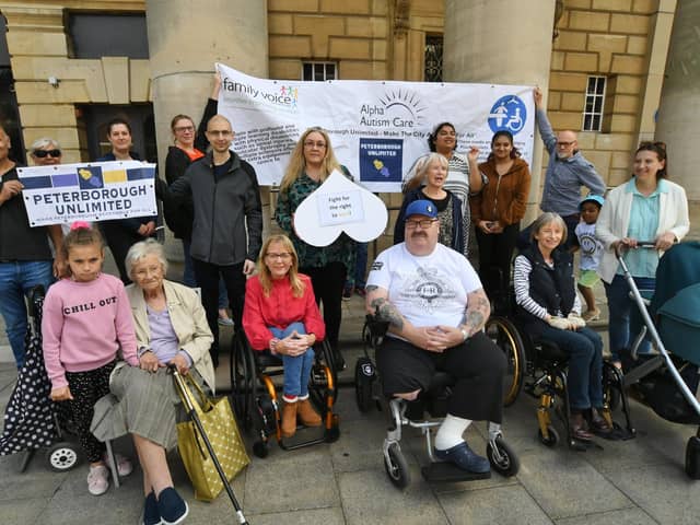 Peterborough Unlimited campaigners gathered outside the Town Hall. Photo: David Lowndes.