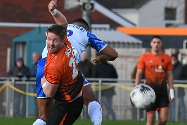 Michael Gash (orange) in action for Peterborough Sports. Photo David Lowndes.