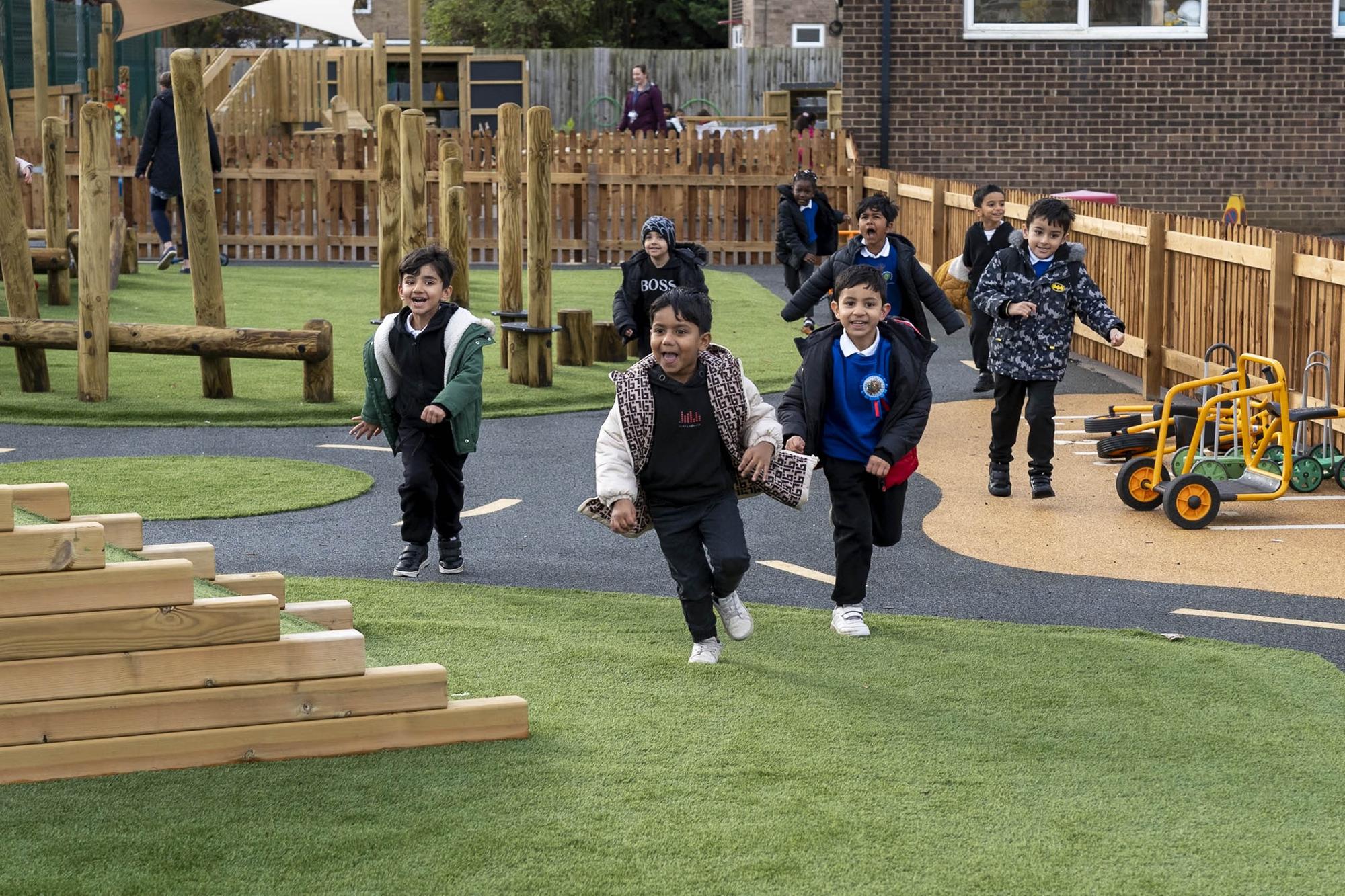 Children enjoying the new outdoor play area.