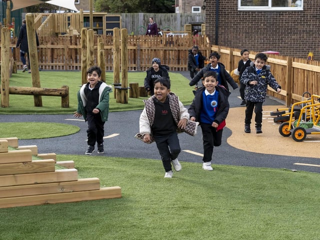 Children enjoying the new outdoor play area.