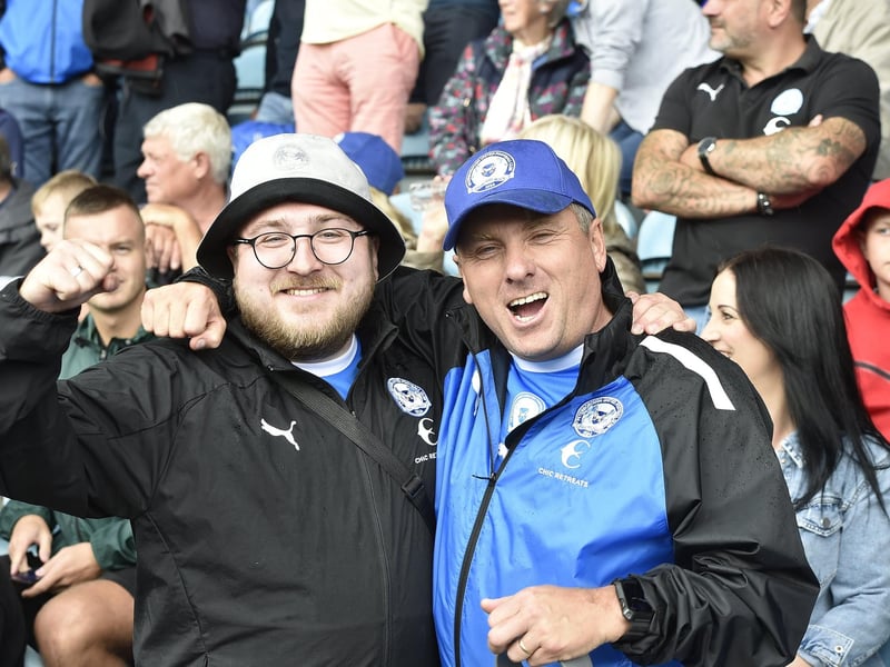 Peterborough United fans watch their side's defeat to Derby County.