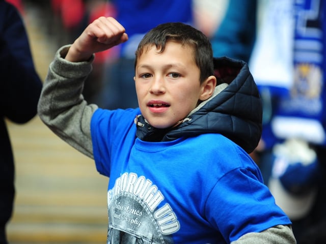 Peterborough United fans soak in the Wembley atmosphere in 2014.