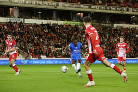 Kwame Poku of Peterborough United scores the third goal against Barnsley. Photo: Joe Dent/theposh.com./