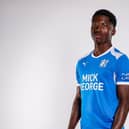 David Kamara models the new Posh home strip complete with the new club crest. Photo Joe Dent/theposh.com