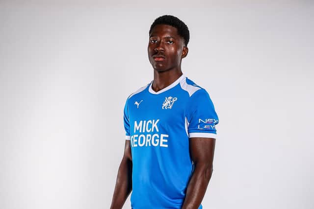 David Kamara models the new Posh home strip complete with the new club crest. Photo Joe Dent/theposh.com