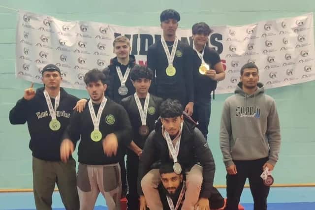 Futuwwa Wrestling Club members with their medal haul.
