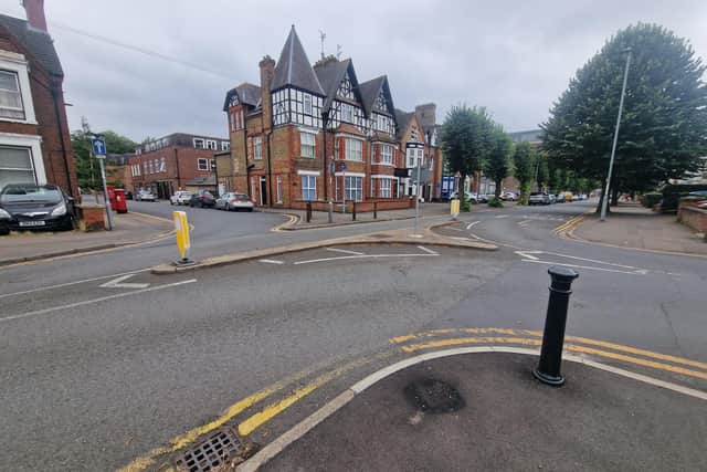 The section of road outside of the vets.