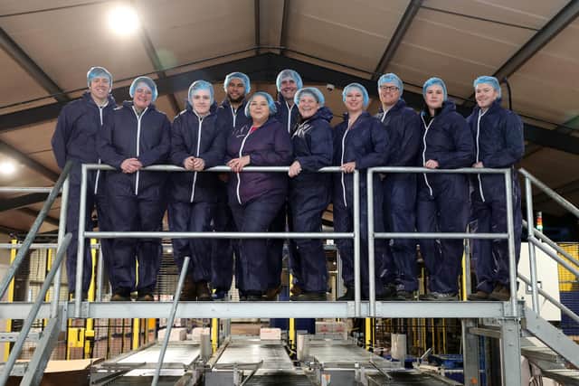Sam Carling and a group of cross-party MPs on the NFU visit to Oaklands Farm. Picture by Adam Fradgley