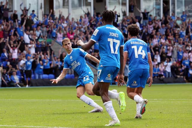 Hector Kyprianou of Peterborough United wheels away to celebrate scoring his goal against Charlton. Photo: Joe Dent/theposh.com.