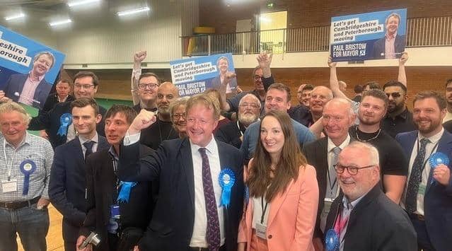 Paul Bristow celebrates with his wife and Conservative party colleagues after his CPCA mayoral election win