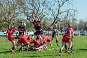KIeran Frost (aerial) scored two tries for Oundle at Barnes. Photo Matt Fleming