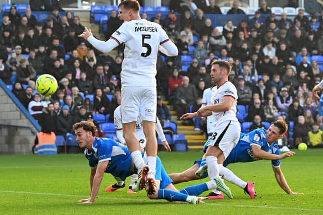 Harry Leonard (right) struck the crossbar with this shot. Photo David Lowndes.