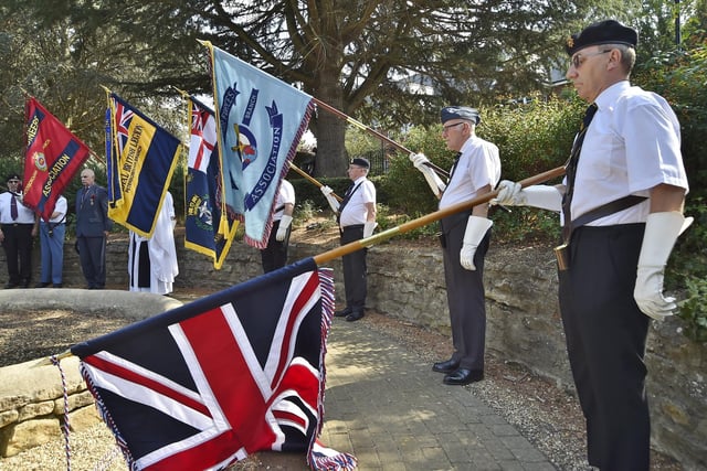 VJ Day memorial service at Central Park with Royal British Legion standard bearers on duty.