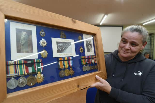 Caron Blackall with her medals returned by  the Talavera Detachment No1 Company Cambs ACF 