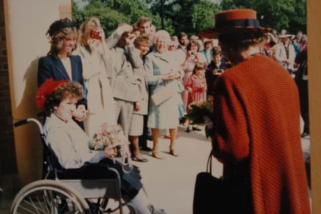 Lorraine Cherry, meets the Queen in 1988