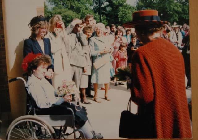 Lorraine Cherry, meets the Queen in 1988