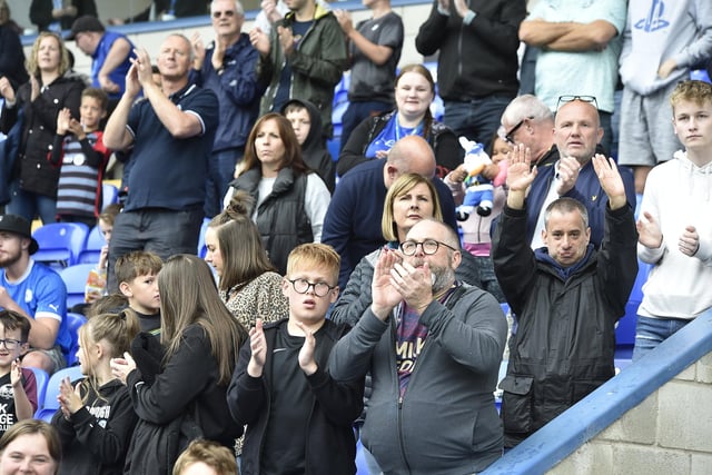 Peterborough United fans are pictured enjoying the win over Bristol Rovers.
