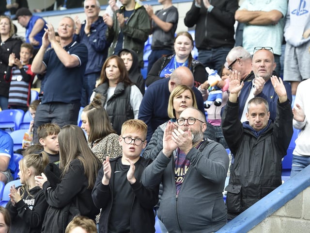 Peterborough United fans are pictured enjoying the win over Bristol Rovers.