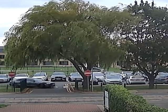 The Audi A5 can be seen approaching the main road near Stanground Academy in Peterborough