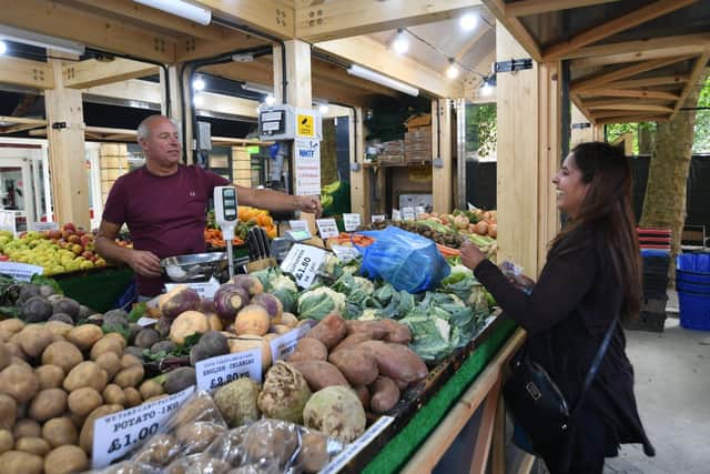 Steve Wetherill on his fruit and veg stall at Bridge Street market on a dry, pleasant day: “People walk twice as fast in the rain, even with umbrellas.”