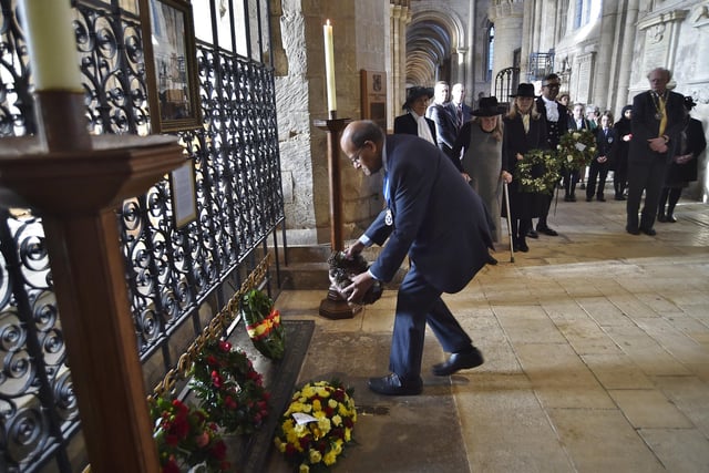 Commemoration Service for Katharine of Aragon at Peterborough Cathedral.  High Sheriff Bharat Khetani laying a wreath at the grave
