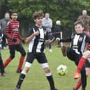 Action from Park Farm Pumas v Peterborough Lions (black and white) in the Under 12 Hereward Cup Final. Photo: David Lowndes.