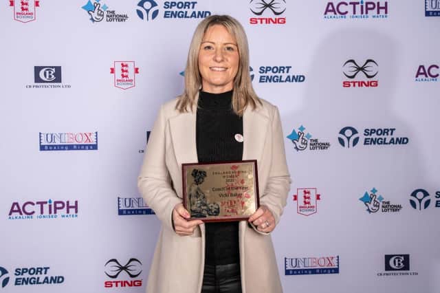 Vicki Baker with her national coaching award.