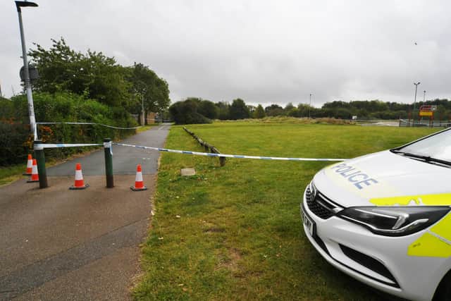 Police cordon in place at the field near the Charteris Centre at Normanton Road, Welland