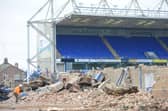 Demolition of the Moy's End stand at London Road in 2013.