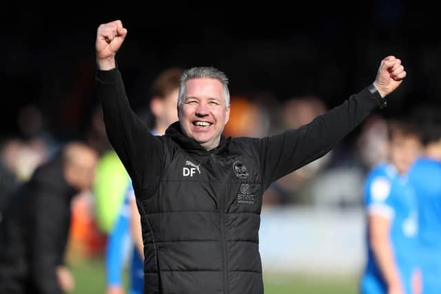Darren Ferguson celebrates victory over Cambridge. Photo: Joe Dent.