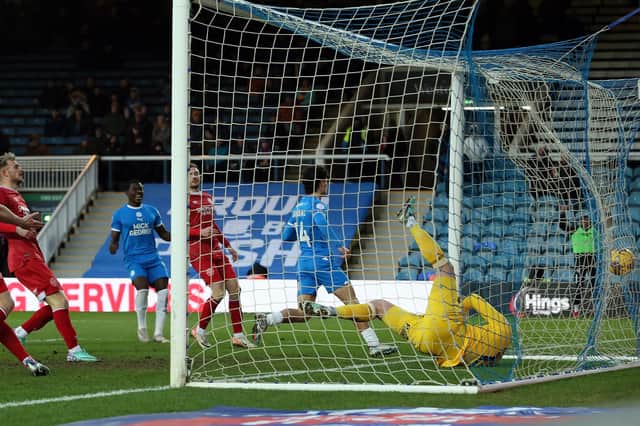 Joel Randall of Peterborough United scores the equalising goal. Photo: Joe Dent.