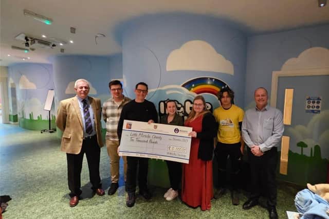 (L-R) Mick Warren, Rhys Perrin, Roy Stockbridge, Michelle King (5th from L) and Trevor Smith (right)