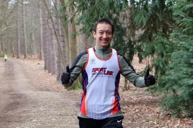 Dick Cheung, 48, was warming up for the 13 mile race when he felt ill and collapsed to the ground where he lay passed out for 20 seconds.