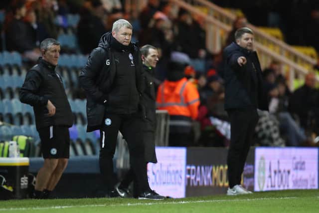 Peterborough United boss Grant McCann watches on from the touchline. Photo: Joe Dent.