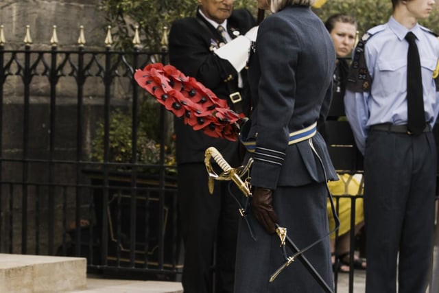 RAF Wittering Station Commander, Wing Commander Nikki Duncan lays at wreath at the town’s
War Memorial.